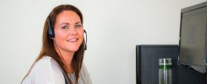 lady with a headset on making calls